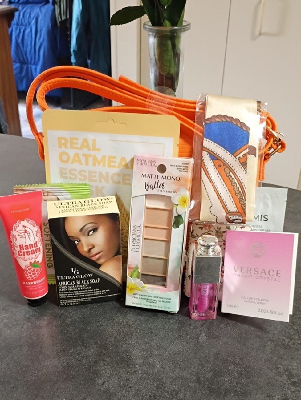Orange Crossbody Bag with Dior Lip Glow Oil, Physicians Formula And Skincare Set